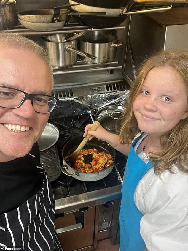 Scott Morrison (pictured left) posted this photo of him with his daughter Lily (right) cooking a curry on Facebook, but the pair quickly found themselves the subject of comments from online trolls.