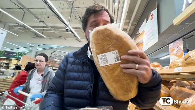 At one point, Tucker, 54, exclaims, 'Look at that!' while he smells a loaf of bread while jovial music plays. But the soundtrack turns somber when Tucker reaches the checkouts and notices the price equivalent to $400 for a week's worth of food for him and his team.