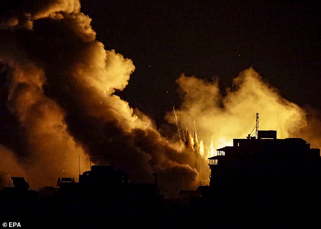 Smoke rises after an Israeli airstrike in the Tal Al-Hawa neighborhood of Gaza City