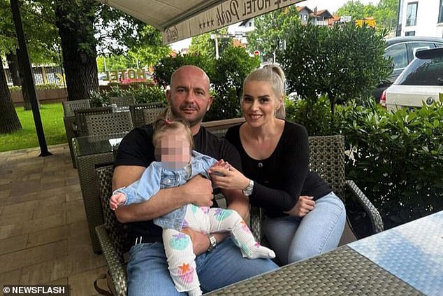 Grandmother Nusret remembers seeing her granddaughter with her mouth open during the brutal attack (pictured: Nermin Sulejmanovic poses with his wife and son in an undated photo)