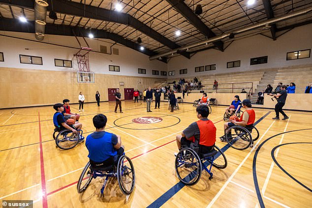 The teams in the wheelchair basketball game.  The event coincided with Invictus Games 2025's goal to partner with local First Nations: Líl̓wat, Musqueam, Squamish and Tsleil-Waututh.