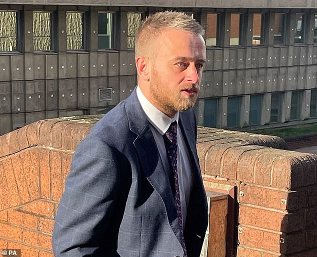 Dale Houghton, pictured arriving at Sheffield Magistrates' Court, was charged with a public order offense after he was seen laughing while holding a photo of Lowery.