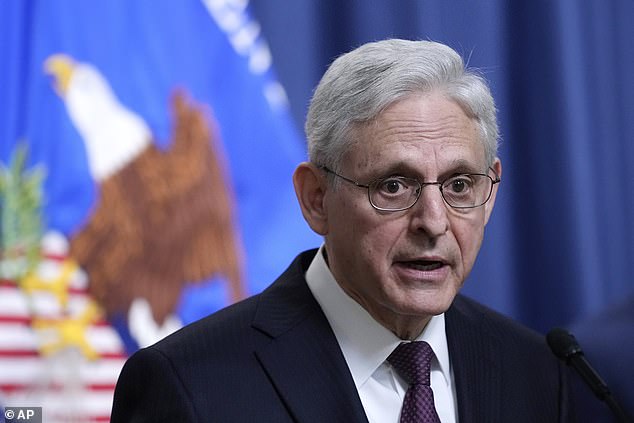 Attorney General Merrick Garland speaks during a press conference at the Department of Justice.