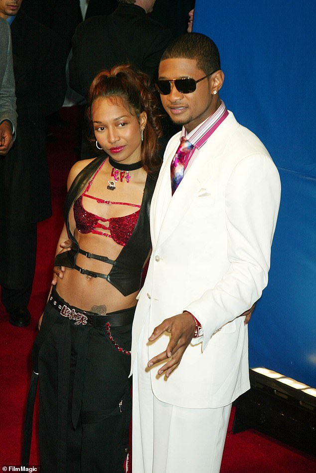 The singer doesn't think twice about Usher's recent confessions, according to a source who spoke to TMZ; They are seen in 2003.