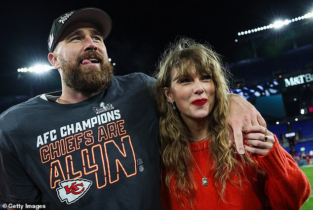 Travis Kelce and Taylor Swift celebrate the Kansas City Chiefs reaching the Super Bowl