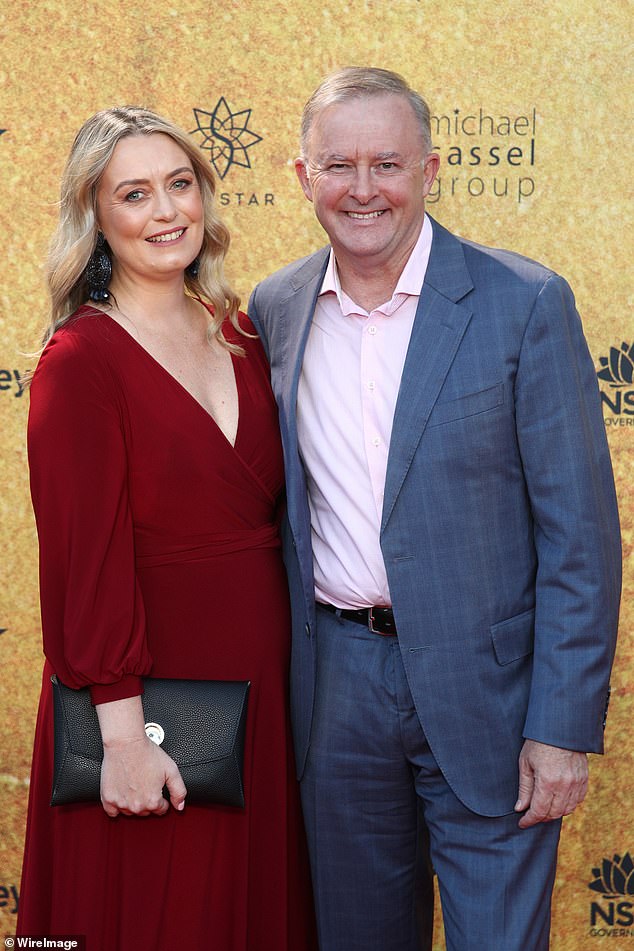 If Albanese prevailed on Saturday, he would also be Australia's seventh Catholic prime minister (pictured with girlfriend Jodie Haydon).