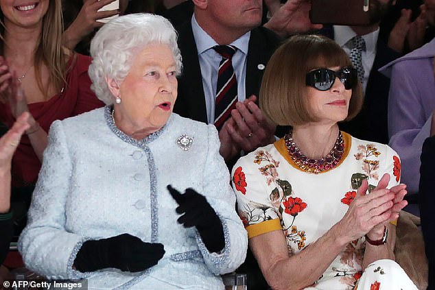 Queen Elizabeth II with Vogue editor Anna Wintour at a Richard Quinn show in 2018