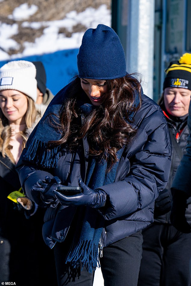Meghan Markle Was Seen Smiling And Taking Photos While Watching Prince Harry