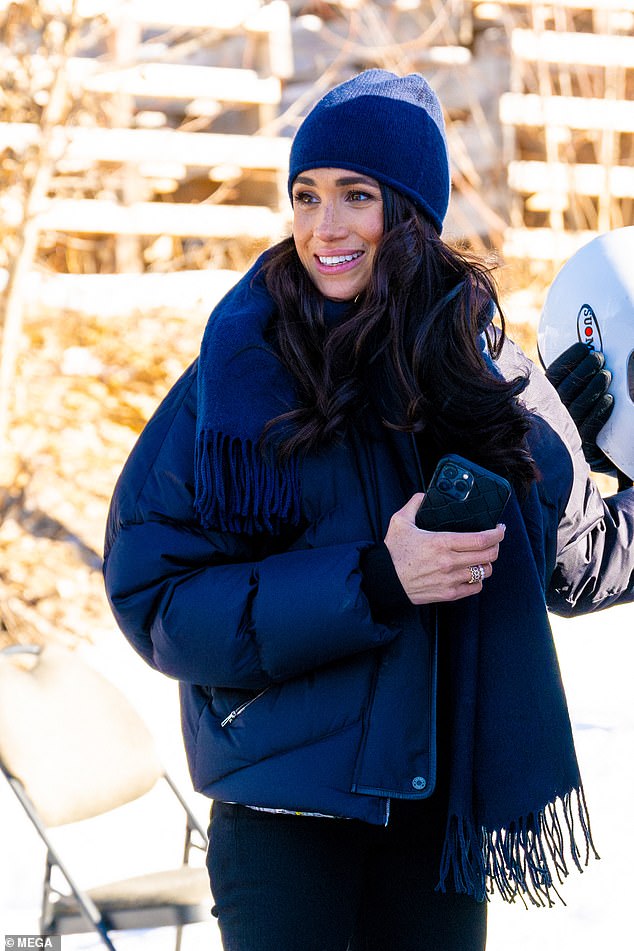 Meghan bundled up against the cold in a £3,000 Hermes puffer jacket, paired with her favorite 'Valerie' skinny jeans from La Ligne, which cost £135.