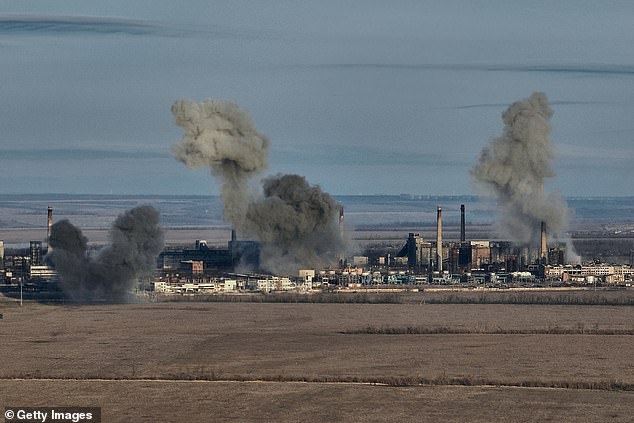General view of smoke coming out of the Avdiivka chemical and coking plant on February 15, 2023 in Avdiivka district, Ukraine