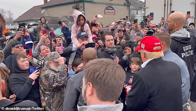 Trump speaking to residents of East Palestine, Ohio, during his visit last year
