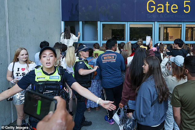 Security and police were seen trying to bring the crowd to order as the MCG was completely overrun.