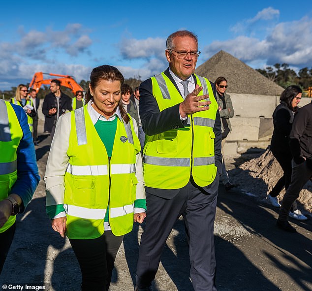 Morrison (pictured in Launceston with his wife Jenny on Thursday) has been advocating for the Coalition to be stronger on national security and better at managing the economy.