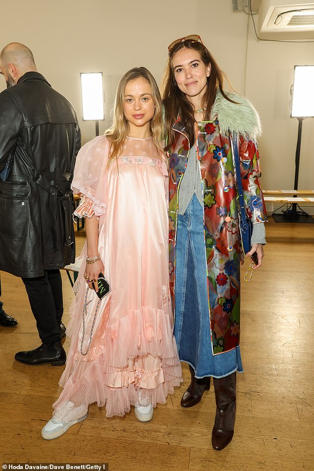 Natalie Salmon turned heads in a fur-trimmed floral trench coat as she joined Lady Amelia.