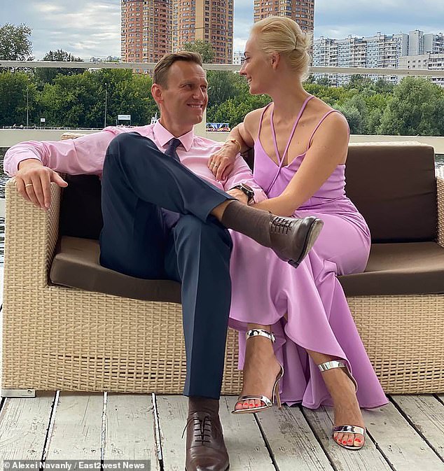 Navalny, pictured with his wife Yulia in happier times, crusaded against official corruption and organized mass anti-Kremlin protests, drawing the Kremlin's ire.