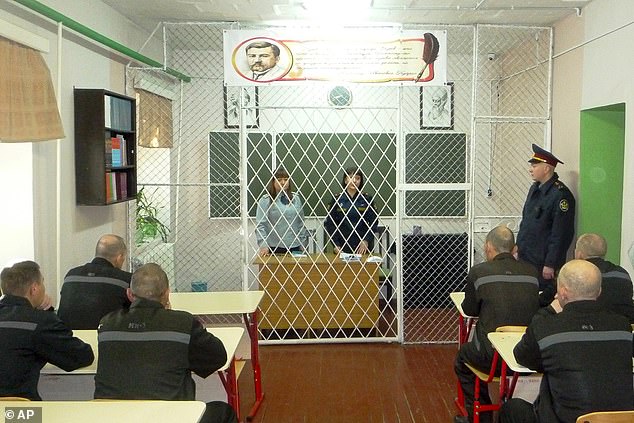 A group of prisoners sit during classes inside the penal colony where Alexei Navalny's associates say he has been located.