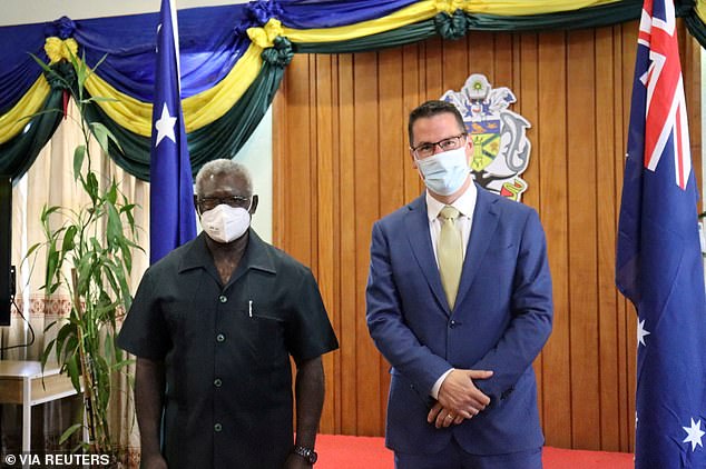 Solomon Islands Prime Minister Manasseh Sogavare and Australian Minister for International Development and the Pacific Zed Seselja last month.