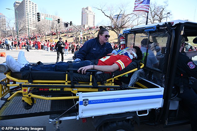 Several people were seen being carried away on stretchers, and at least 21 people were shot in the horrific incident.