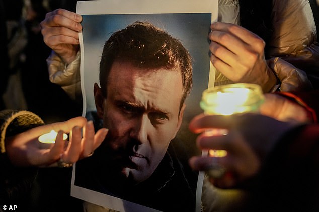 Protesters hold vigil in Berlin to demonstrate against Navalny's death announced today