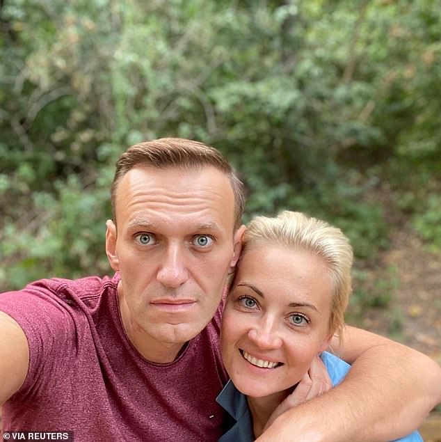 Navalny (pictured with his wife Yulia Navalnaya) miraculously survived an alleged assassination attempt with a nerve agent in August 2020 during a flight. He was evacuated to a hospital in Germany and the use of the nerve agent Novichok was later confirmed.