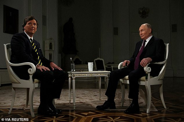Tucker Carlson during his 'soft' interview with Vladimir Putin
