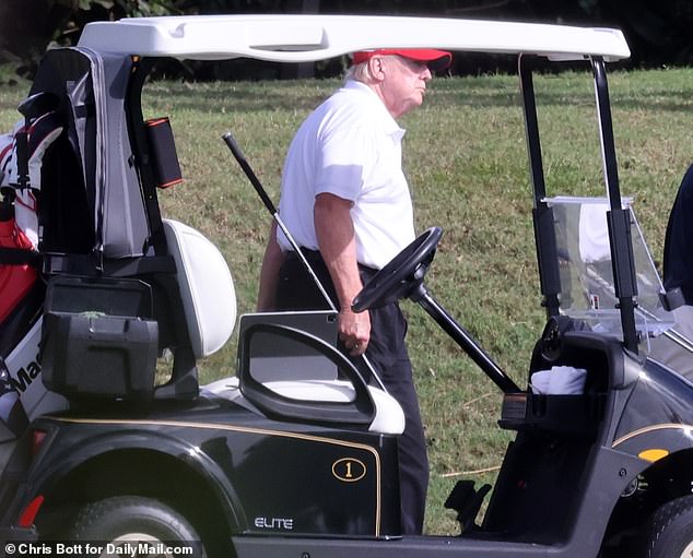 Trump playing at his Trump International golf course in West Palm Beach in a recent photo
