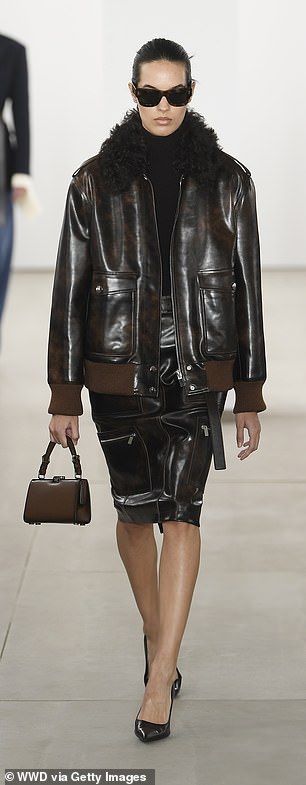 A leather bomber jacket and matching skirt walked the runway at Michael Kors