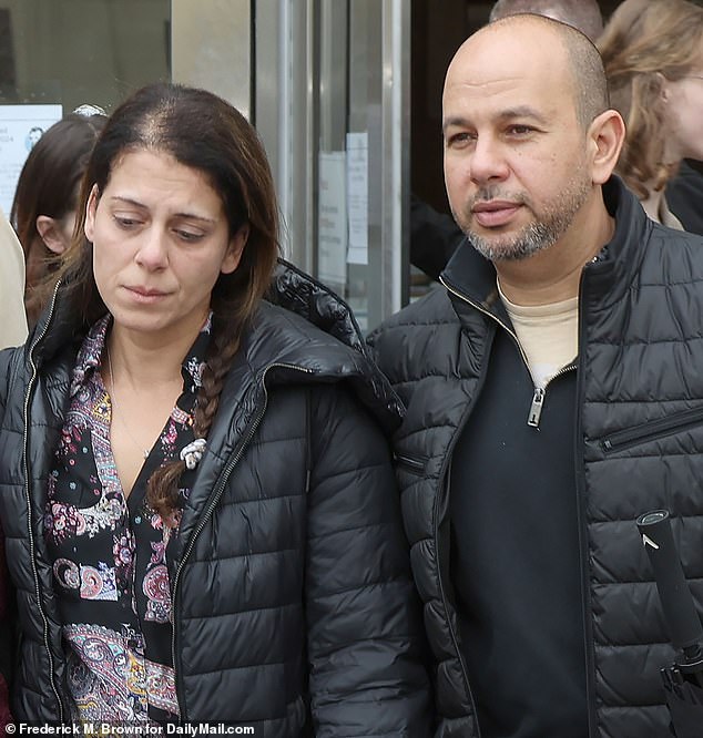 Nancy and Karim Iskander, the children's parents, are shown leaving the courthouse earlier this month. Nancy was crossing the street with the brothers when they were hit.