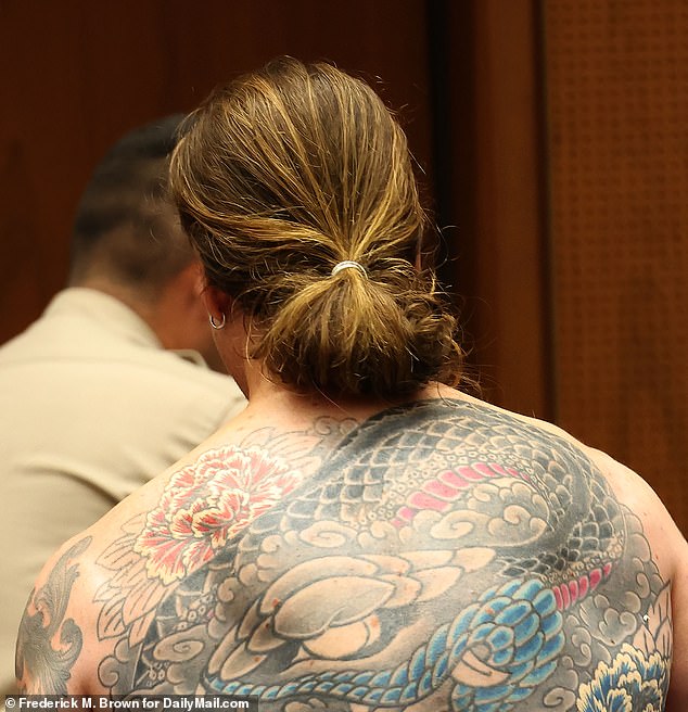 The heavily tattooed 35-year-old is on suicide watch at the LAPD's Valley Jail in Van Nuys.