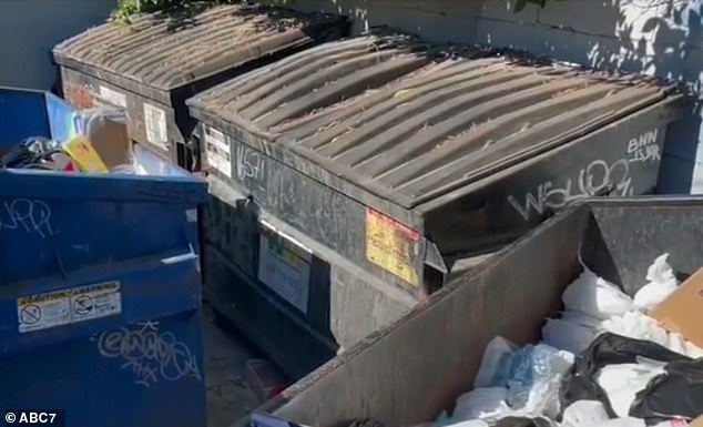 A bag with a headless torso was found stuffed into a duffel bag and dumped in this dumpster behind Ventura Boulevard and Rubio Avenue, near a family-style restaurant, a hair salon, and two banks.