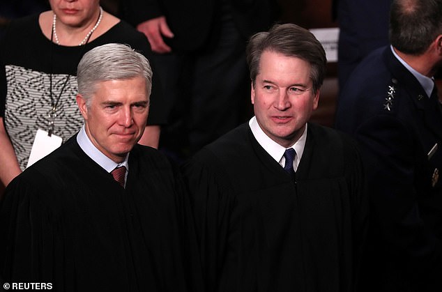 United States Supreme Court Justice Neil Gorsuch and Associate Justice Brett Kavanaugh (R)