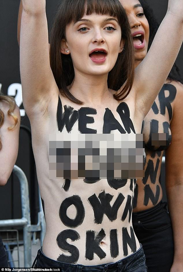 Topless vegan protesters storm London Fashion Week in furious flash mob organized by PETA in 2018