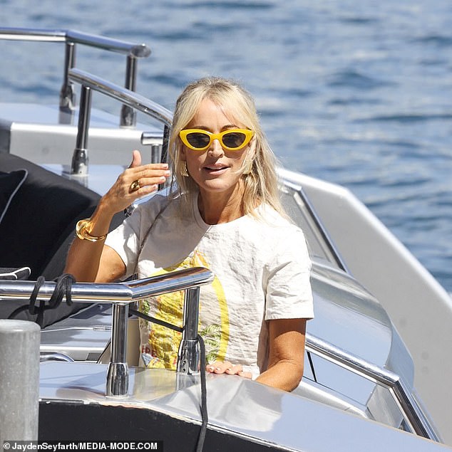 To add glamor to her celebrations, Jackie also changed her outfit and wore a $595 Christopher Esber T-shirt with bananas printed on the front.