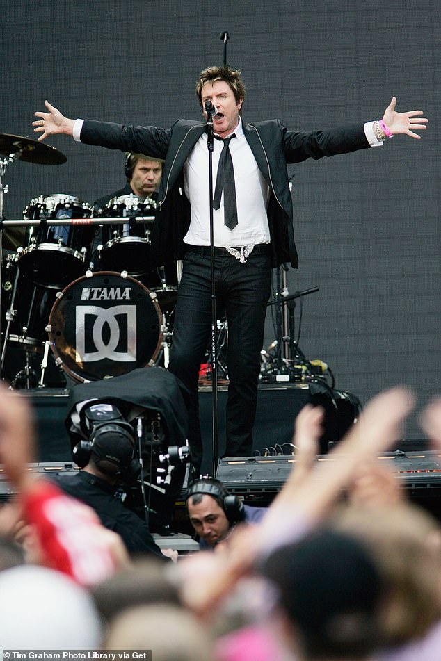 Simon Le Bon of Duran Duran performs on stage at the Concert for Diana at Wembley Stadium which Princes William and Harry organized in 2007 to celebrate their mother's life.