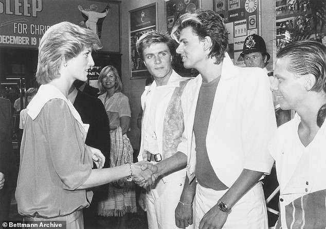 Princess Diana went backstage and shook Andy Taylor's hand after finishing the gala.