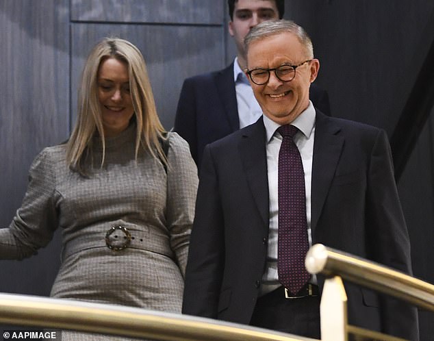 Albanese (pictured with partner Jodie Hayden) insisted he will be a friend to business in government.