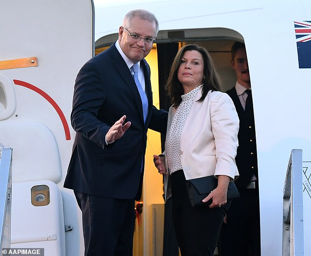 Morrison is pictured with his wife Jenny outside his RAAF plane which he took around the country during the election campaign. He doesn't believe his opponent has changed.