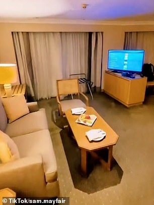 In the video, viewers pass through the keyhole of Sam's spacious suite.