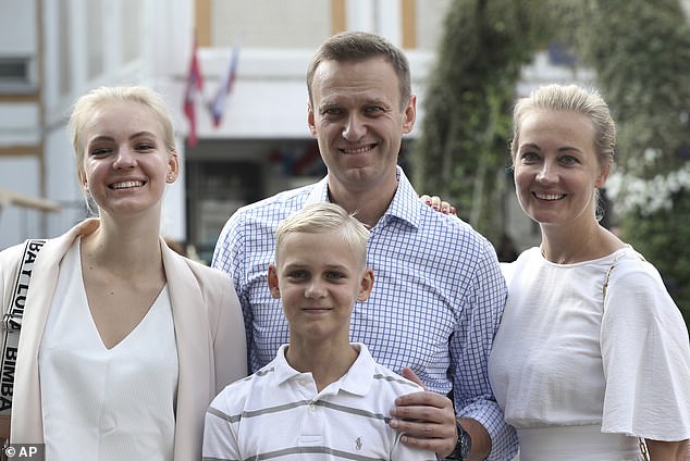 I hesitate to offer any weak message of support to Yulia Navalnaya and the two children of pro-democracy dissident Alexei Navalny. Except this: say her name. Save his memory. And his death will not be in vain. (Above) Alexei Navalny, with his wife Yulia, right, his daughter Daria and his son Zakhar on September 8, 2019