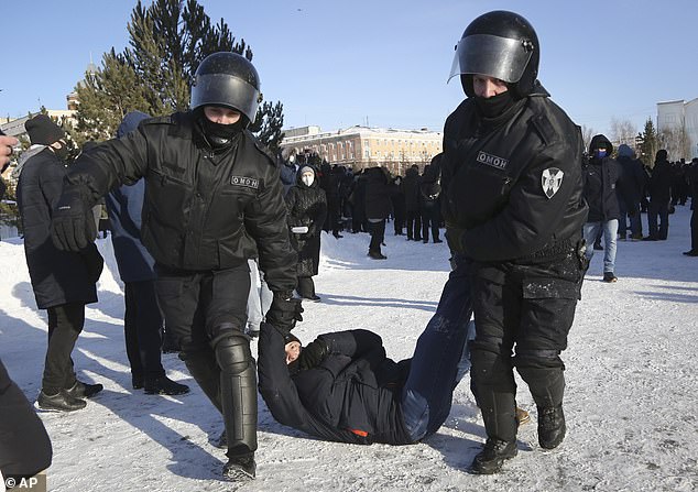 If Carlson were truly horrified by the murder of political dissidents, he would have recognized that no Russian citizen, regardless of wealth, is free.  (Above) Police detain a man during a protest against the imprisonment of opposition leader Alexei Navalny in the Siberian city of Omsk, Russia, on January 31, 2021.
