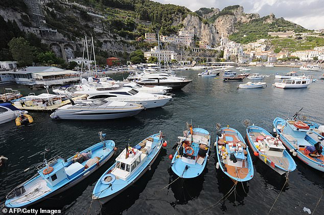 Travel experts suggest that visiting Italy's Amalfi Coast in the shoulder season can save thousands of dollars and may cost just a few cloudy days.