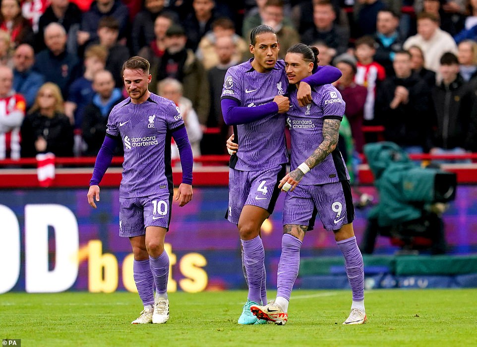 Núñez is congratulated by Alexis Mac Allister (left) and Virgil van Dijk (centre) after opening the scoring in west London.