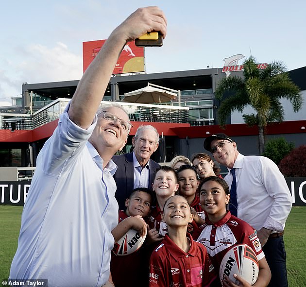The Prime Minister (pictured at a rugby league club in Brisbane) believes state premiers were responsible for 