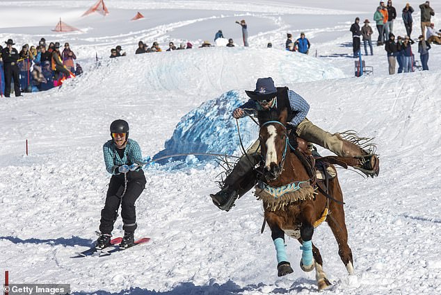 Skier Kate Serpe is pulled by rider Braiden Klinger in a Skijoring competition on February 25, 2023 in Driggs, Idaho.
