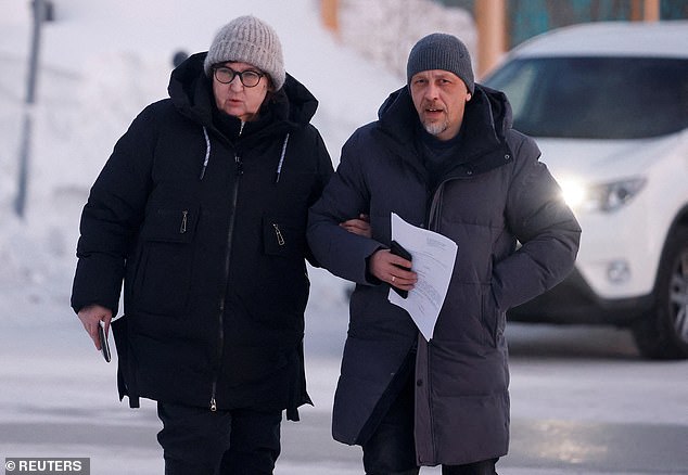 Lyudmila Navalnaya, mother of the late Russian opposition leader Alexei Navalny, and lawyer Vasily Dubkov arrive at the regional department of the Russian Investigative Committee in the town of Salekhard in the Yamal-Nenets region, Russia, February 17, 2024 .