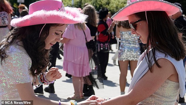 The international trend has earned the term 'Taylor-gating', despite warnings from the MCG urging fans to attend the venue only if they have tickets.