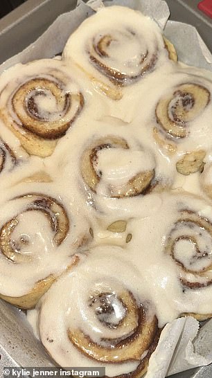 Jenner later showed her fans the baked cinnamon rolls covered in a sugary glaze before diving in to enjoy them.