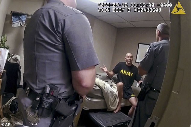 The footage offers a chilling glimpse of Card after he became involved in an altercation and locked himself in his motel room, alarming reservists.