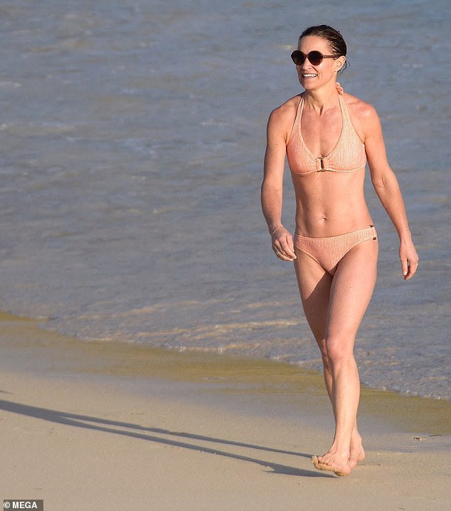 The socialite wore an apricot bikini to enjoy another day at the beach in St Barts