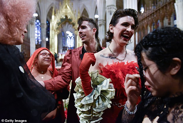 Fishnet stockings, miniskirts and even a boa made from $100 bills adorned mourners at the service.
